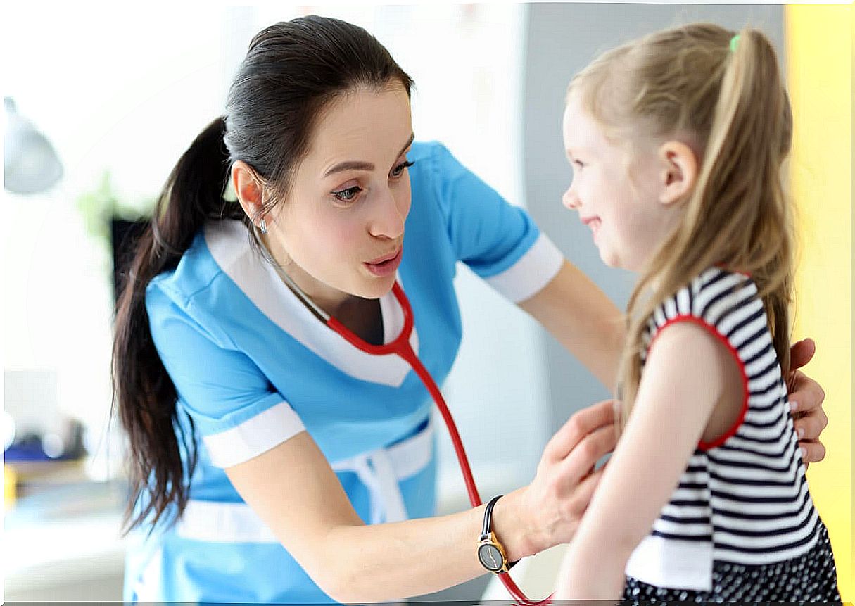 Little girl at the pediatrician with breathing problems.