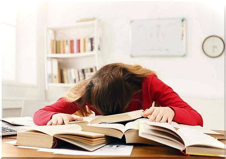 sleeping girl on books