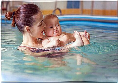 Teaching children to swim helps strengthen family bonds. 