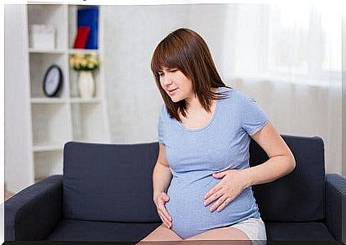 A woman who has contractions and pain during her pregnancy.