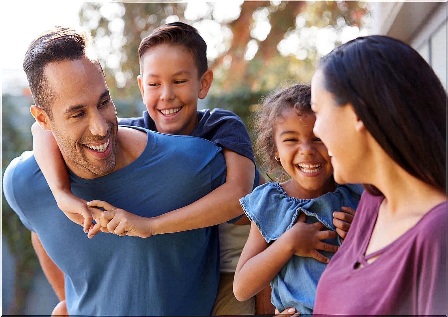 Parents in family with their children. 