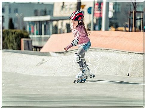 child rollerblading