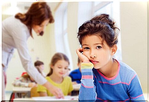 A bored little girl at school.