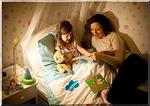 Mom reading a story to help her child sleep