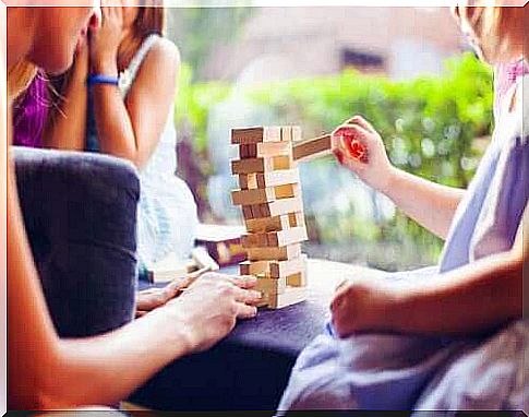 A family playing Jenga