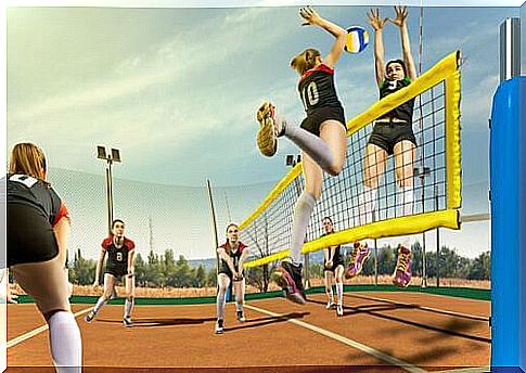 Young people play volleyball