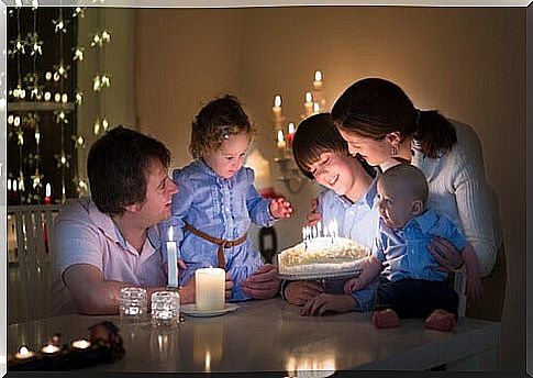 A family celebrating a birthday