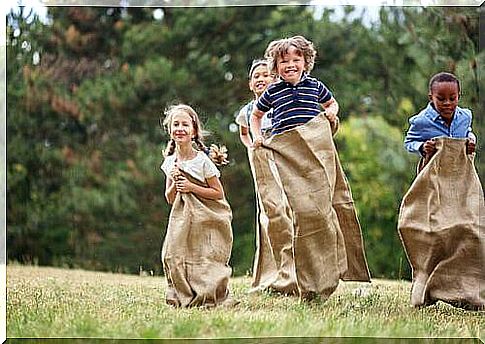 Children do a sack race