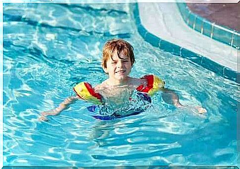 A child learning to swim