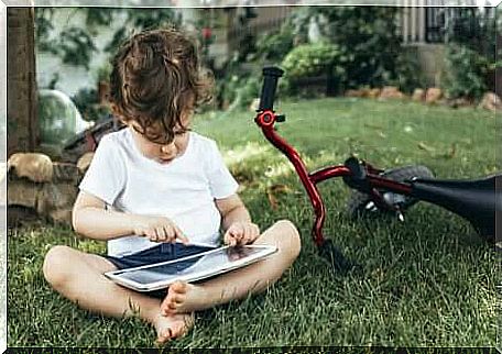 A child using a tablet.